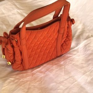 Vera Bradley quilted bag. Rust